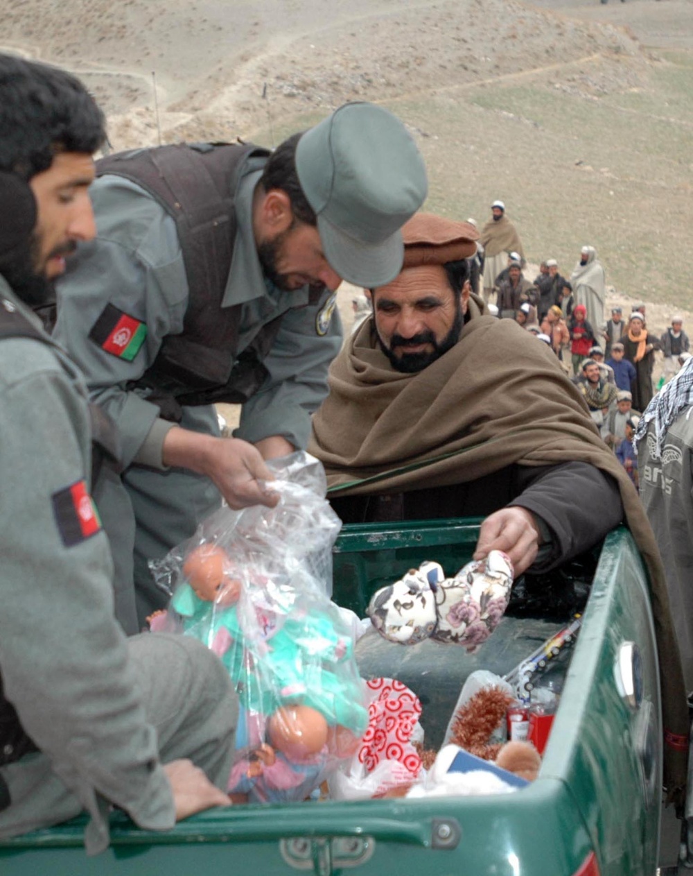 Afghan Children Receive Gifts from U.S. Humvees