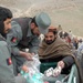 Afghan Children Receive Gifts from U.S. Humvees