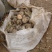 Concerned Iraqis Turn Over Weapons Cache to U.S. Troops