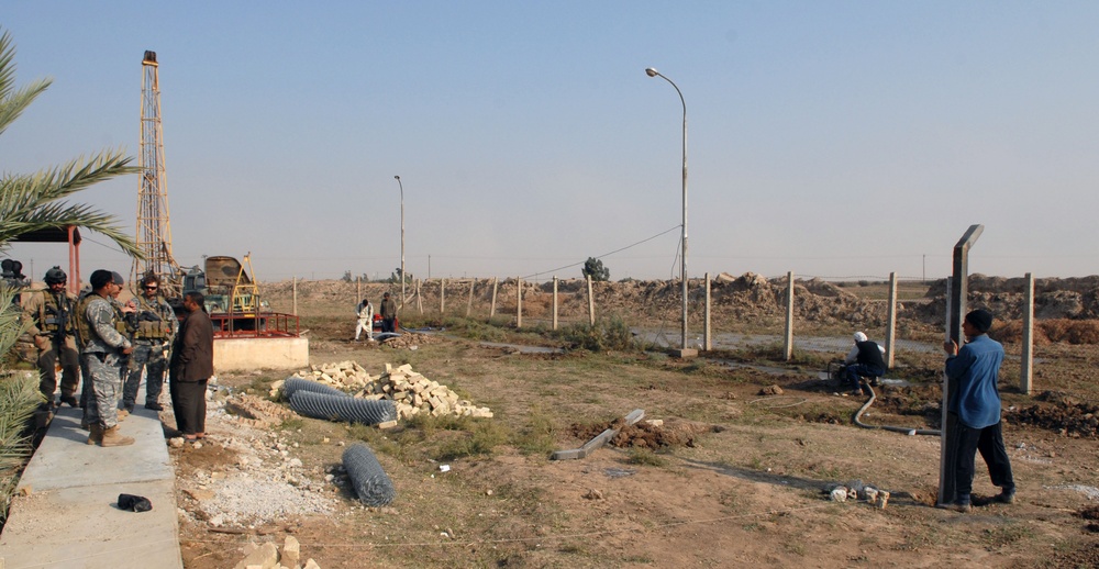 U.S. Forces Collaborate with Volunteers to Provide Drinking Water in Iraqi Village