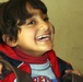 Iraqi Boy Receives New Wheelchair with Joy