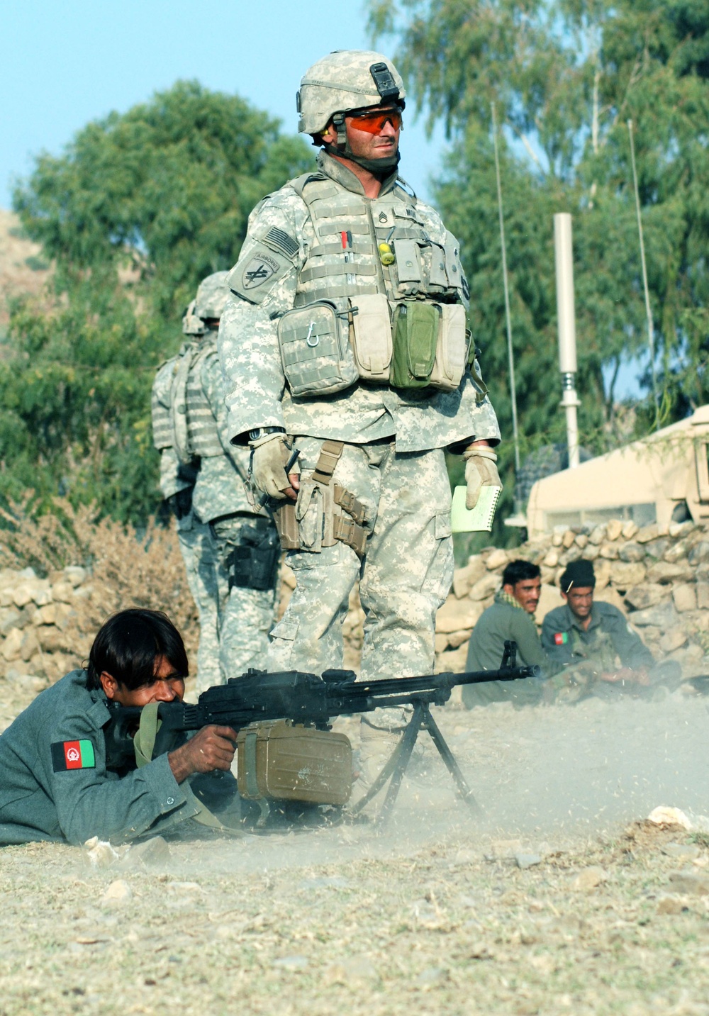 U.S. Soldier Mentors Afghan Border Police in Weapons Training