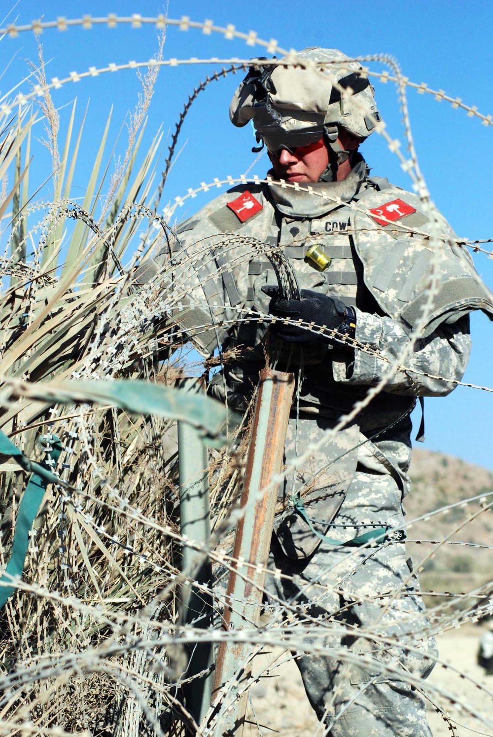 U.S. Soldier Assists Afghan Border Police with Traffic Control Point