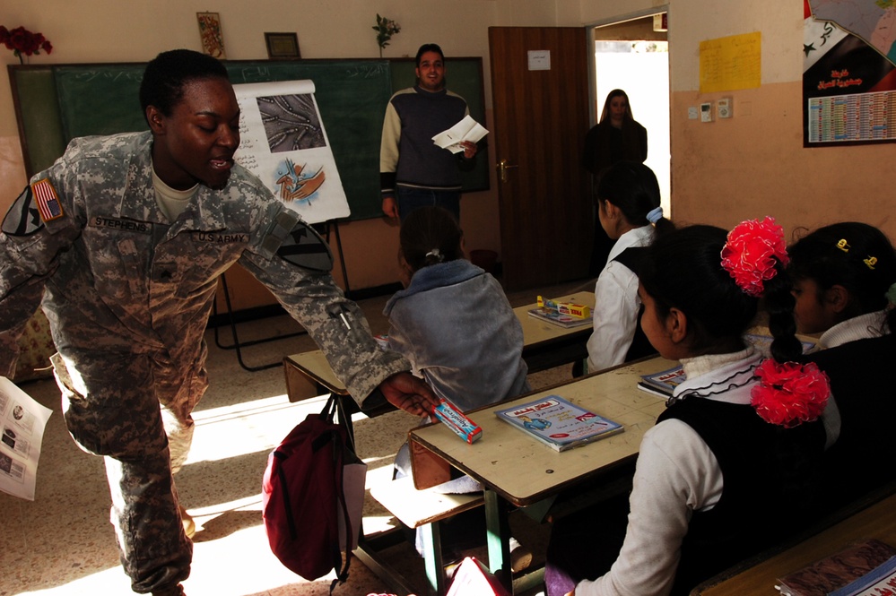Army Medic Promotes Dental Health at Iraqi School