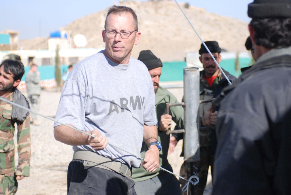 U.S. Soldier Assists Afghan Border Police with Communications Setup