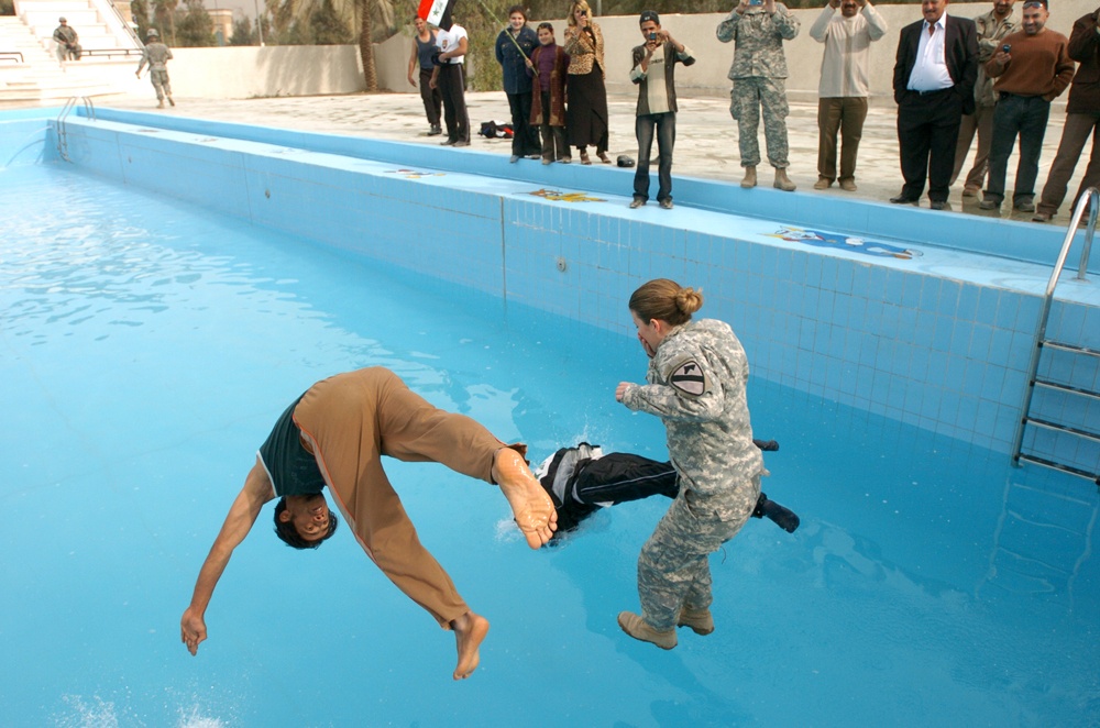 Army Captain Christens New Children's Pool in Baghdad