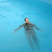Army Captain Swims with Iraqi Children at Zawra Park Pool Opening