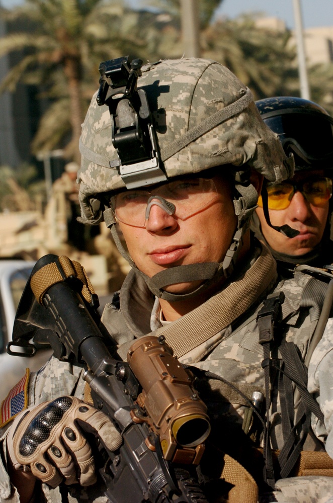 Army Sergeant Provides Security with Iraqi Troops in Baghdad Clearing Operation