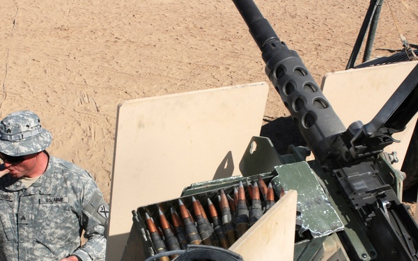 Army Sergeant Grabs Lunch During Patrol in Afghanistan
