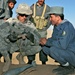 Army Captain Examines Disabled Improvised Explosive Device in Afghanistan