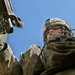 U.S. Soldier Mans .50-Caliber Turret Gun During Afghan Police Convoy