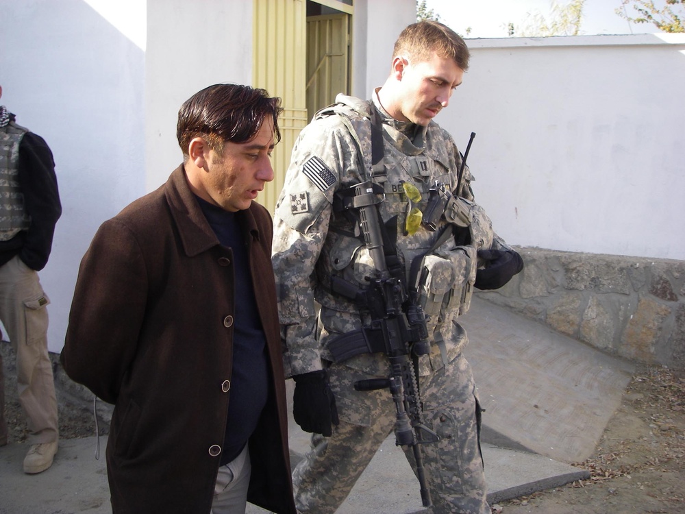 U.S. Army Captain Speaks with Afghan Clinic Contractor Ahead of Ribbon-Cutting Ceremony