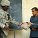 U.S. Soldier Distributes School Supplies to Afghan Teachers