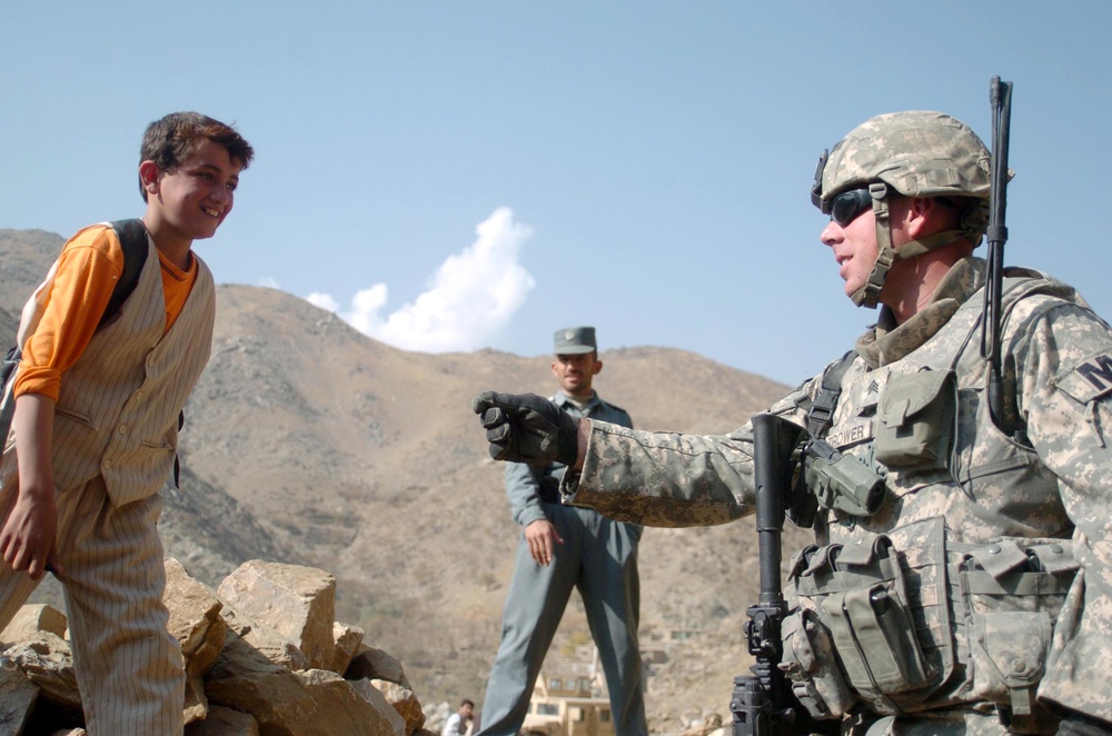 Army Sergeant Distributes School Supplies to Afghan Students