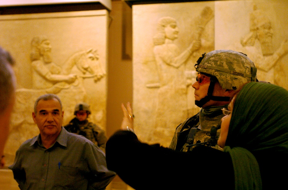Iraqi Museum Director Gives U.S. Army Officer Tour of Exhibits