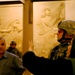 Iraqi Museum Director Gives U.S. Army Officer Tour of Exhibits