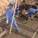Iraqi Workers Pour Concrete for New Gas Turbine Generators in Northern Baghdad