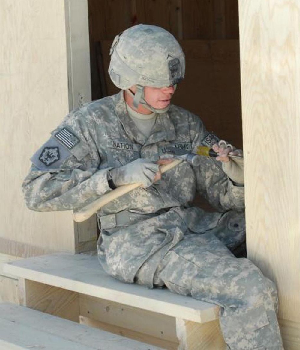 Soldier Completes B-Hut for Polish Troops in Afghanistan
