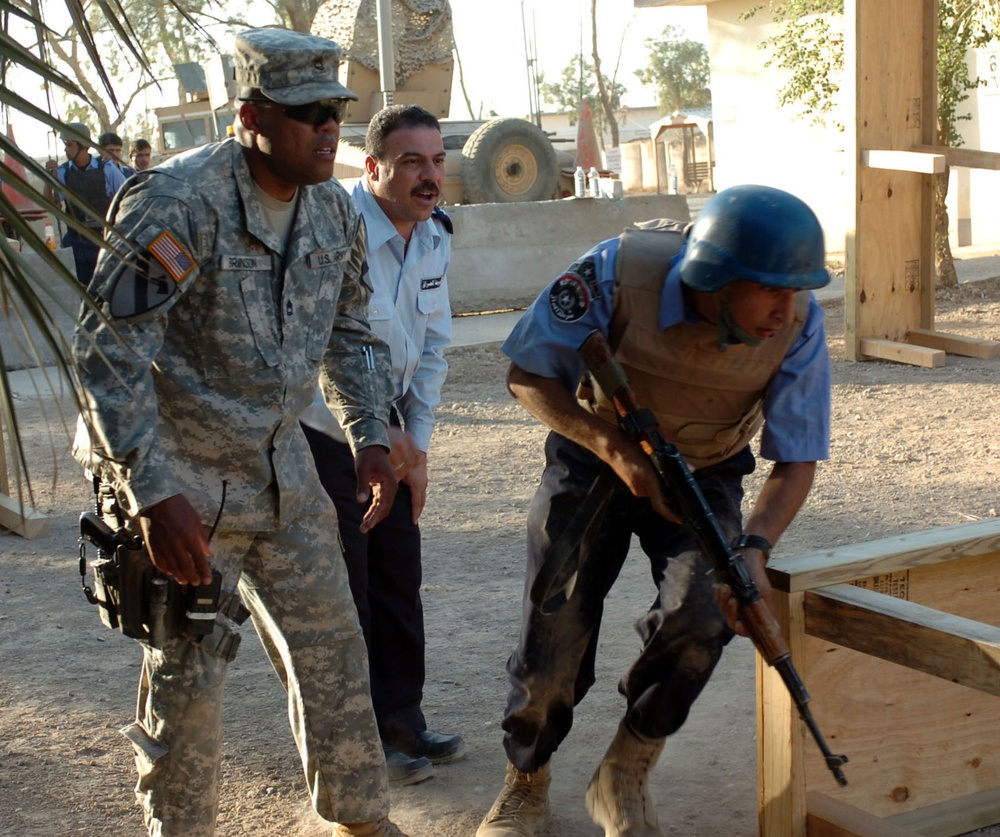 U.S. Sergeant Trains Iraqi Police on Bounding Maneuver