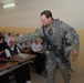 U.S. Army Officer Distributes Backpacks to Students in Baghdad