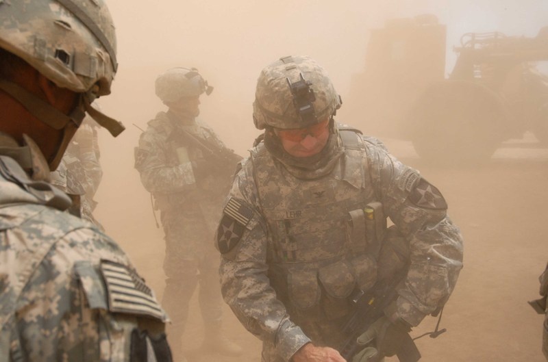 Army Colonel Surveys Battlefield from Black Hawk Helicopter