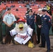 Service Members and USO CEO Pose with Nationals Mascot Screech