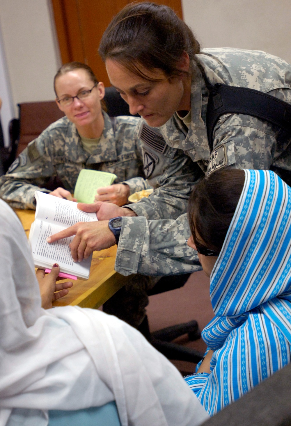 Air Force Captains Teach Afghan Women During Meeting