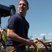 Navy Diver Assists in Raising Russian Submarine in Providence Harbor