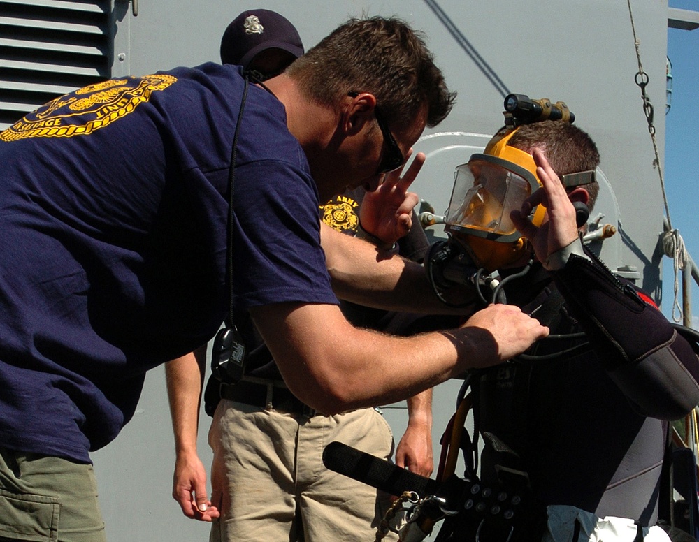 Navy Diver Gives 'OK' Sign During Submarine Recovery Operation