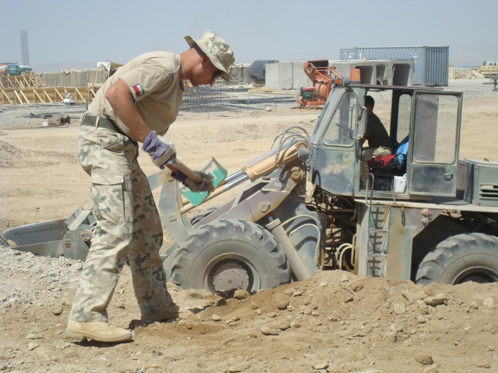 Polish Soldier Completes Culvert Work at Afghan Forward Operating Base