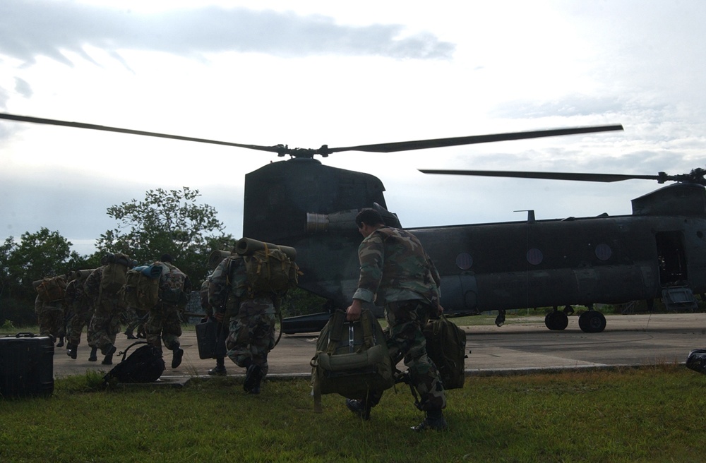 Belizean Troops Transported by U.S. Army Chinook After Hurricane Dean