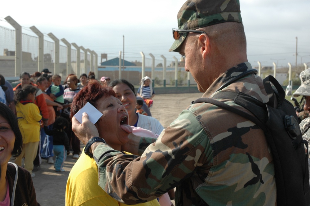 Air Force Nurse Provides Oral Exam During Humanitarian Mission in Peru