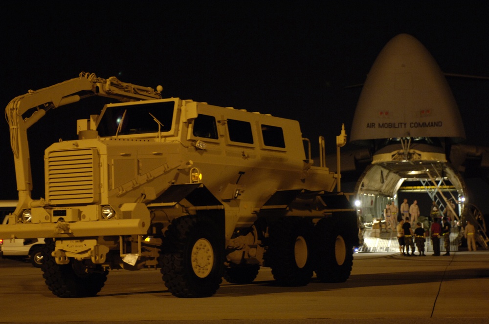 U.S. Air Force Airmen Load MRAP Vehicles onto C-5 Galaxy for Deployment