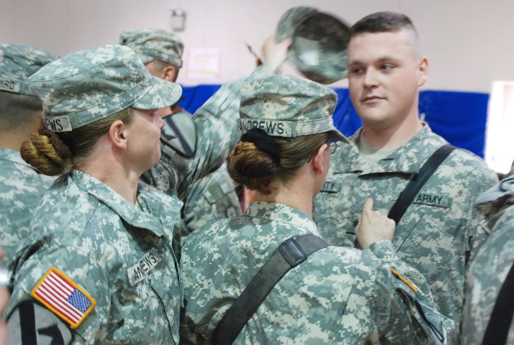 Soldier Promoted, Reunited with Twin Sisters in Iraq