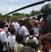Civilians and Military Personnel Collaborate on Humanitarian Aid Effort