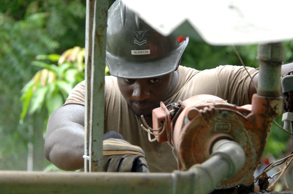 Navy Petty Officer Helps Repair Water Pump at Nicaraguan Health Care Center