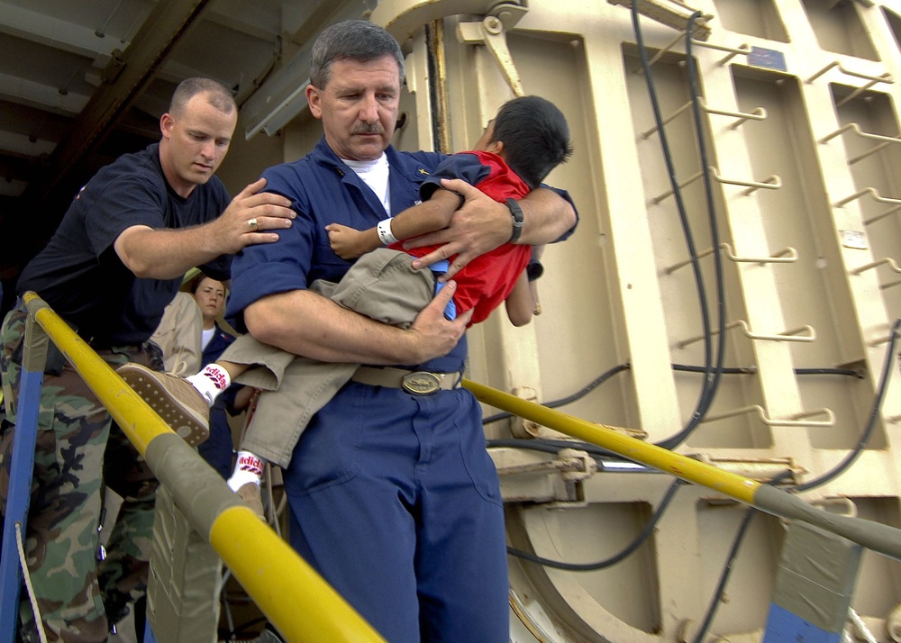 Navy Chaplain Transports Patient from Hospital Ship to Shore