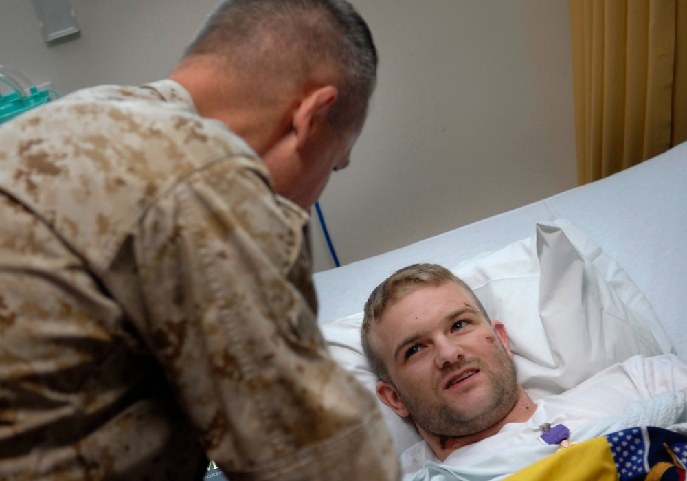 Top Military Leader Honors Wounded Soldier at German Hospital
