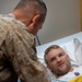 Top Military Leader Honors Wounded Soldier at German Hospital