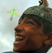 Afghan Boy Flies New Kite with Delight in Ghazni Province