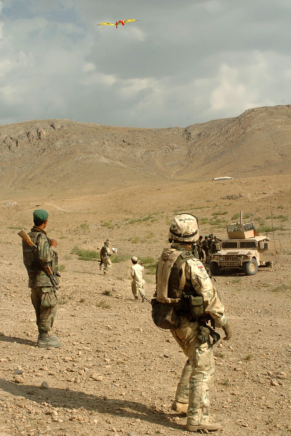 Polish Soldiers Teach Afghan Nomad Boy to Fly Kite