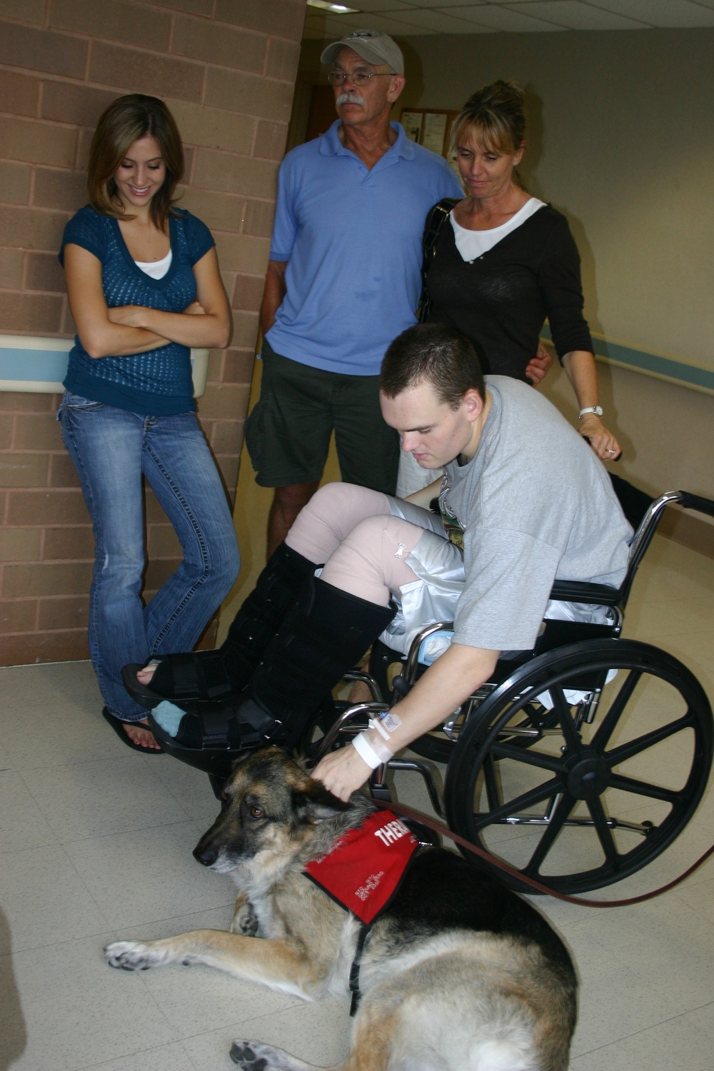 Soldier Bonds with Therapy Dog at Medical Center