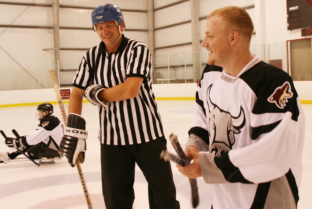 Army General Referees Sled Hockey Game with Disabled Veteran Player