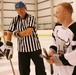Army General Referees Sled Hockey Game with Disabled Veteran Player
