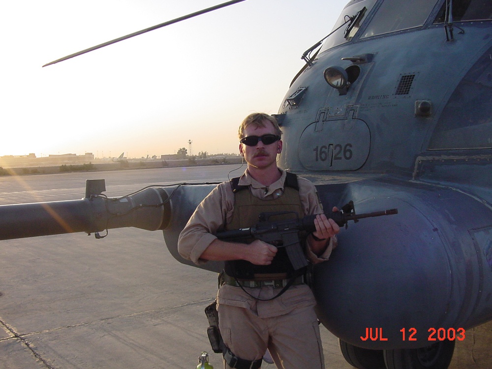 Air Force Tech. Sgt. Poses Near Special Ops Helicopter
