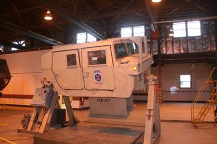 Soldiers Train on Humvee Egress Assistance Trainer at Yakima Training Center