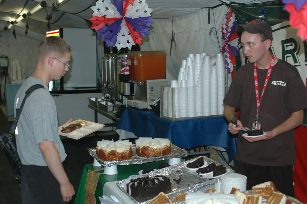Army Soldier Chooses Dessert at Forward Operating Base in Afghanistan