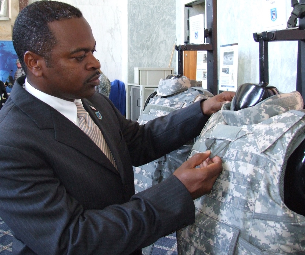Soldier Demonstrates Quick-Release Body Armor Vest