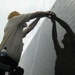 Honoring the Fallen: Visitor Stencils Name at Vietnam Veterans Memorial