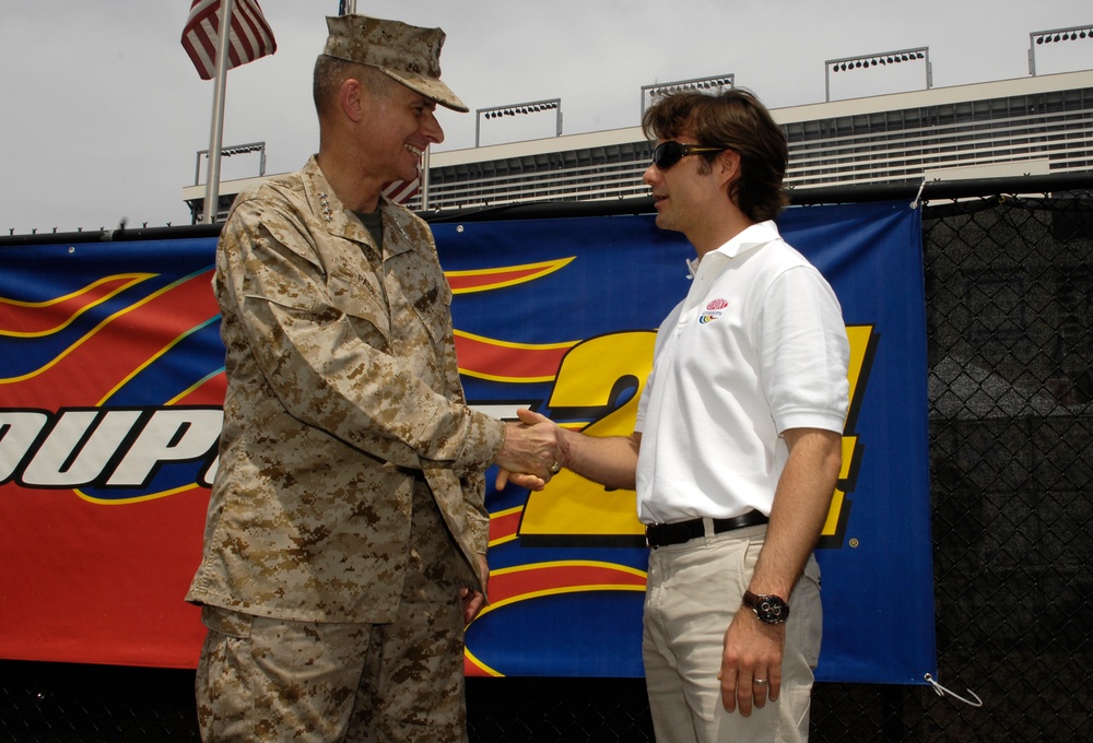 Gen. Pace Shakes Hands with NASCAR Driver Jeff Gordon Before Coca-Cola 600